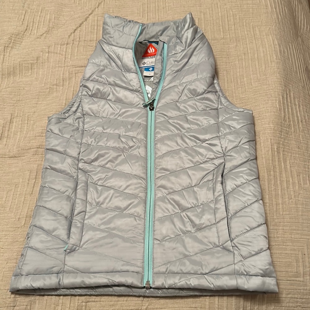 columbia vest. size girls medium.